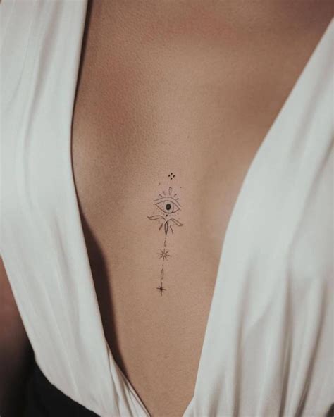 tattoo between boobs|30 Best Tattoo Between Breast Ideas You Should。